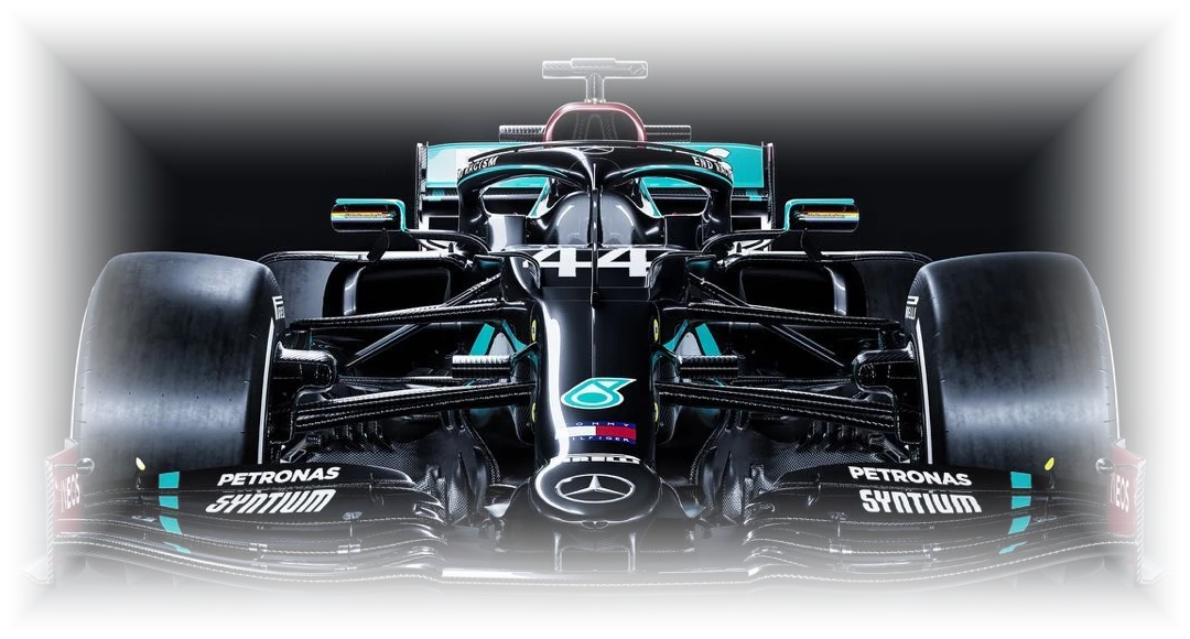 Carro de Fórmula 1 em preto e teal, tema do Build Track SCX